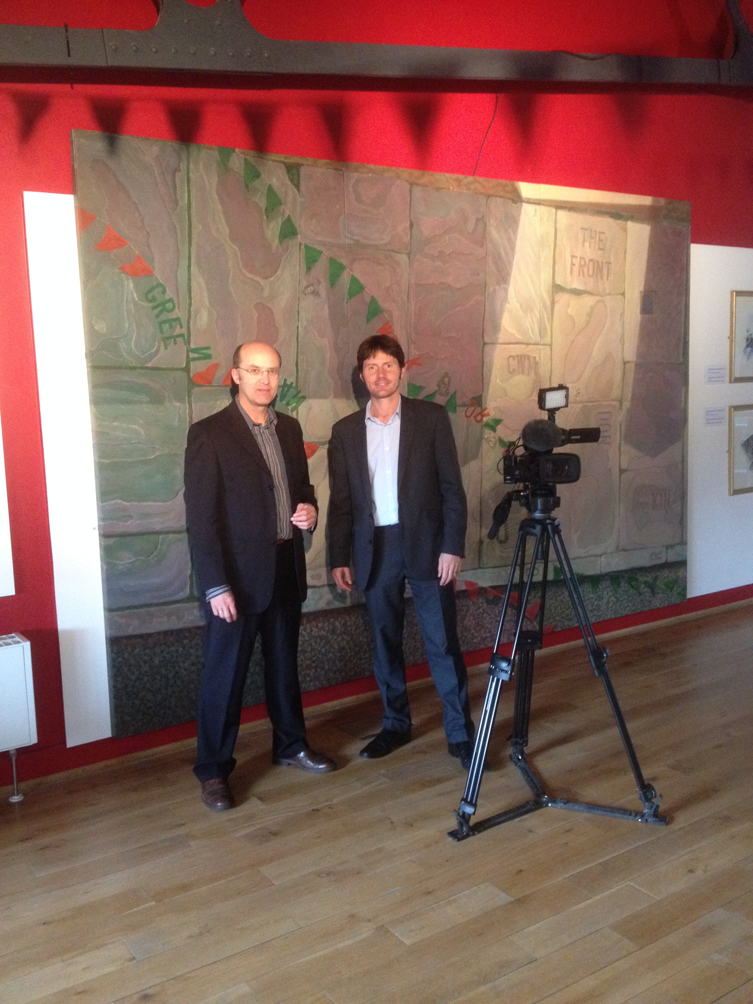 Ceri Thomas with Carwyn Jones of BBC Wales Today television at 'Placing Dylan', Swansea 2014