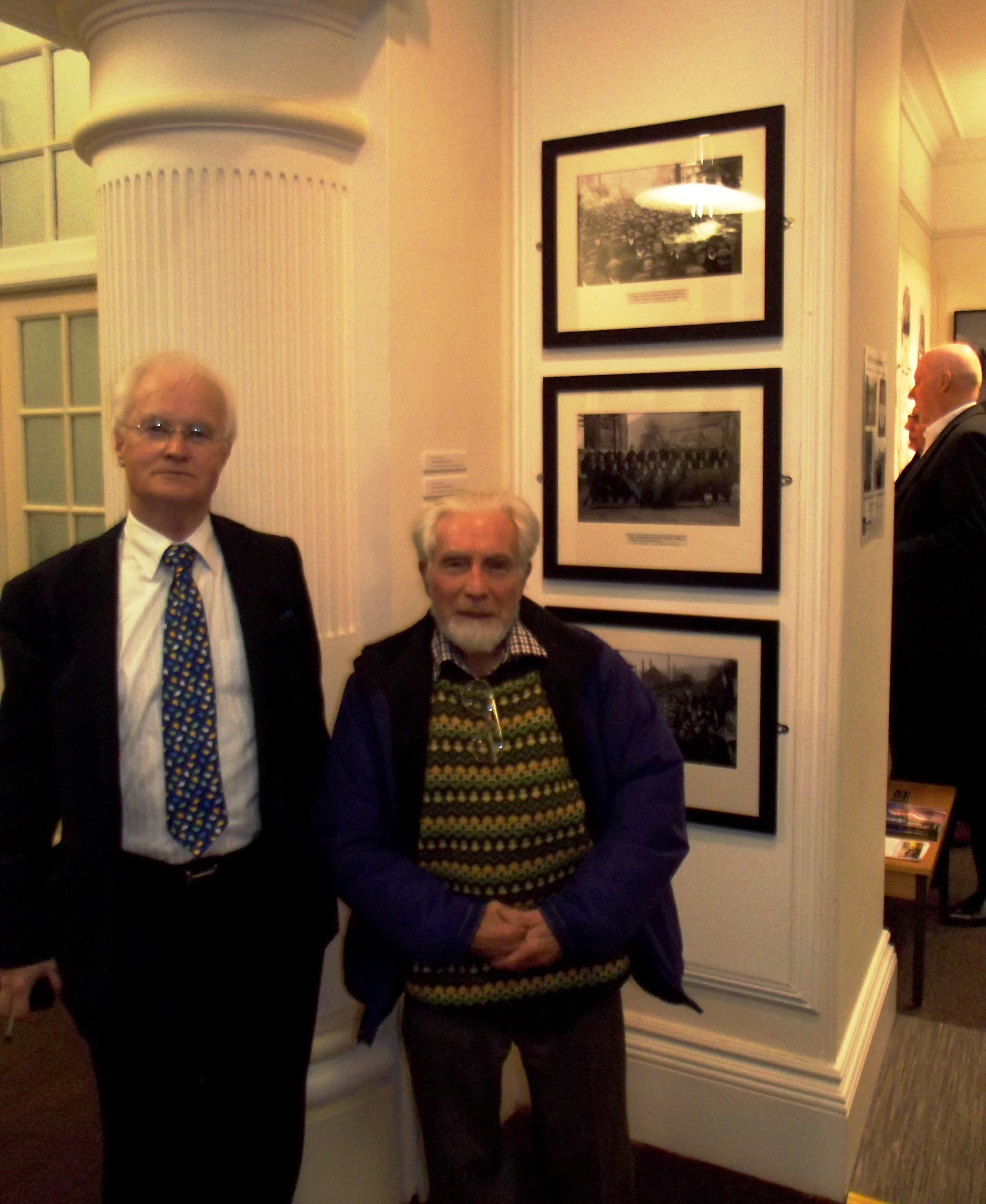 David Maddox and Gwyn Evans with their prints of Levi Ladd's 'Tonypandy Riots' photographs of 1910, Oriel y Bont 4 March 2014