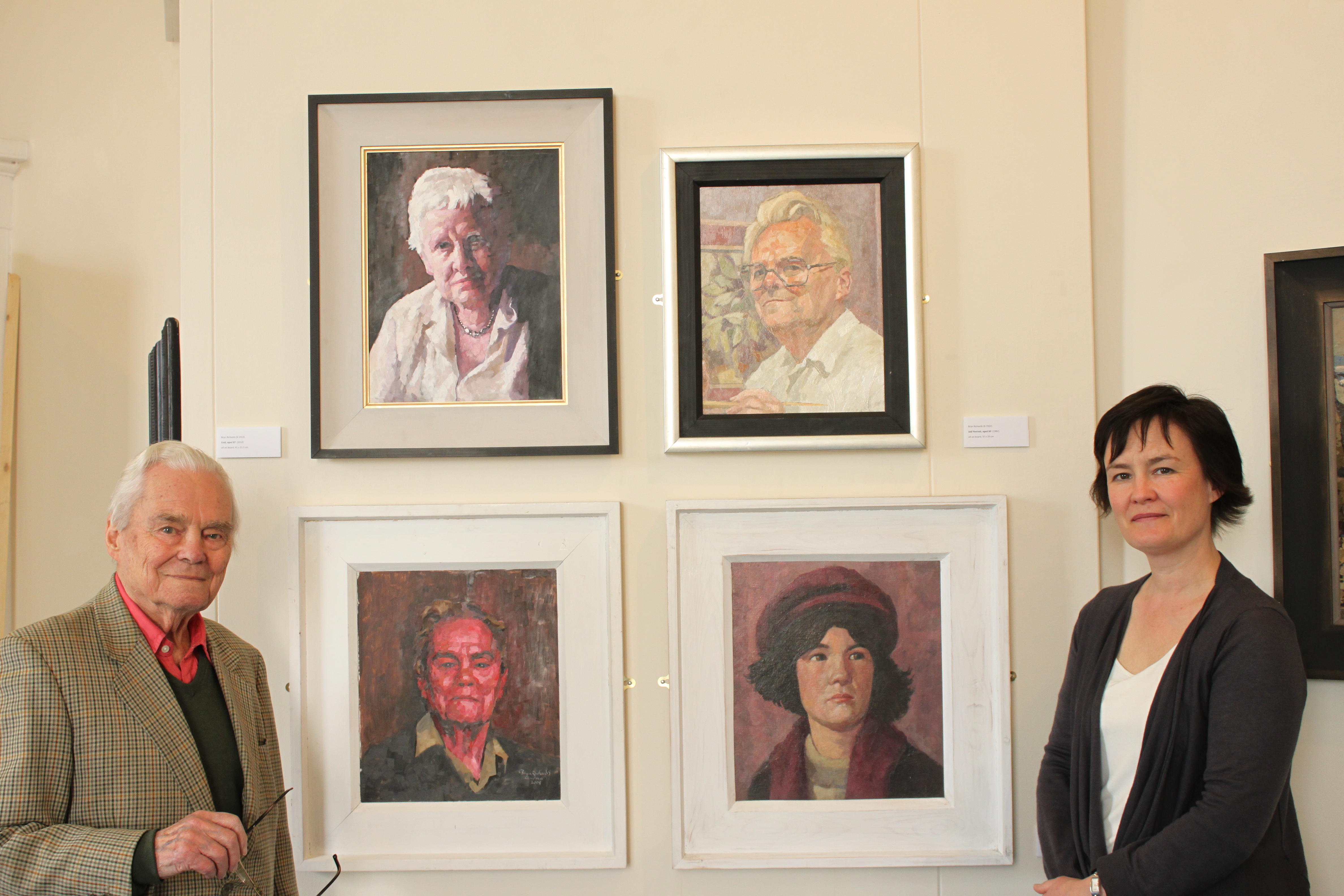 Bryn Richards with his artist-daughter Sarah Richards and some of his family portraits, Oriel y Bont 2012