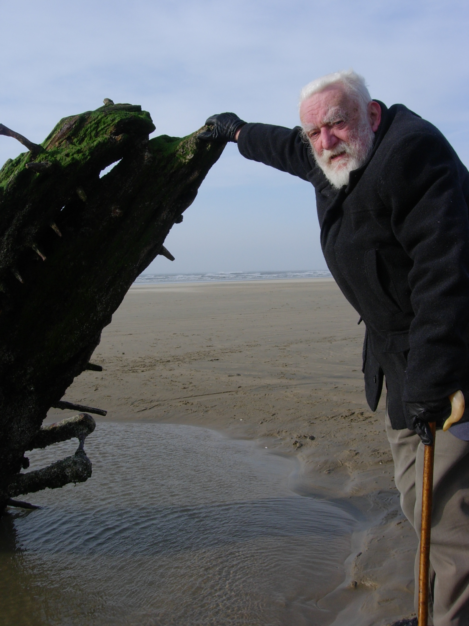Michael Freeman with his inspiration, the wreck of the 'Helvetia', Rhossili, Gower 2011