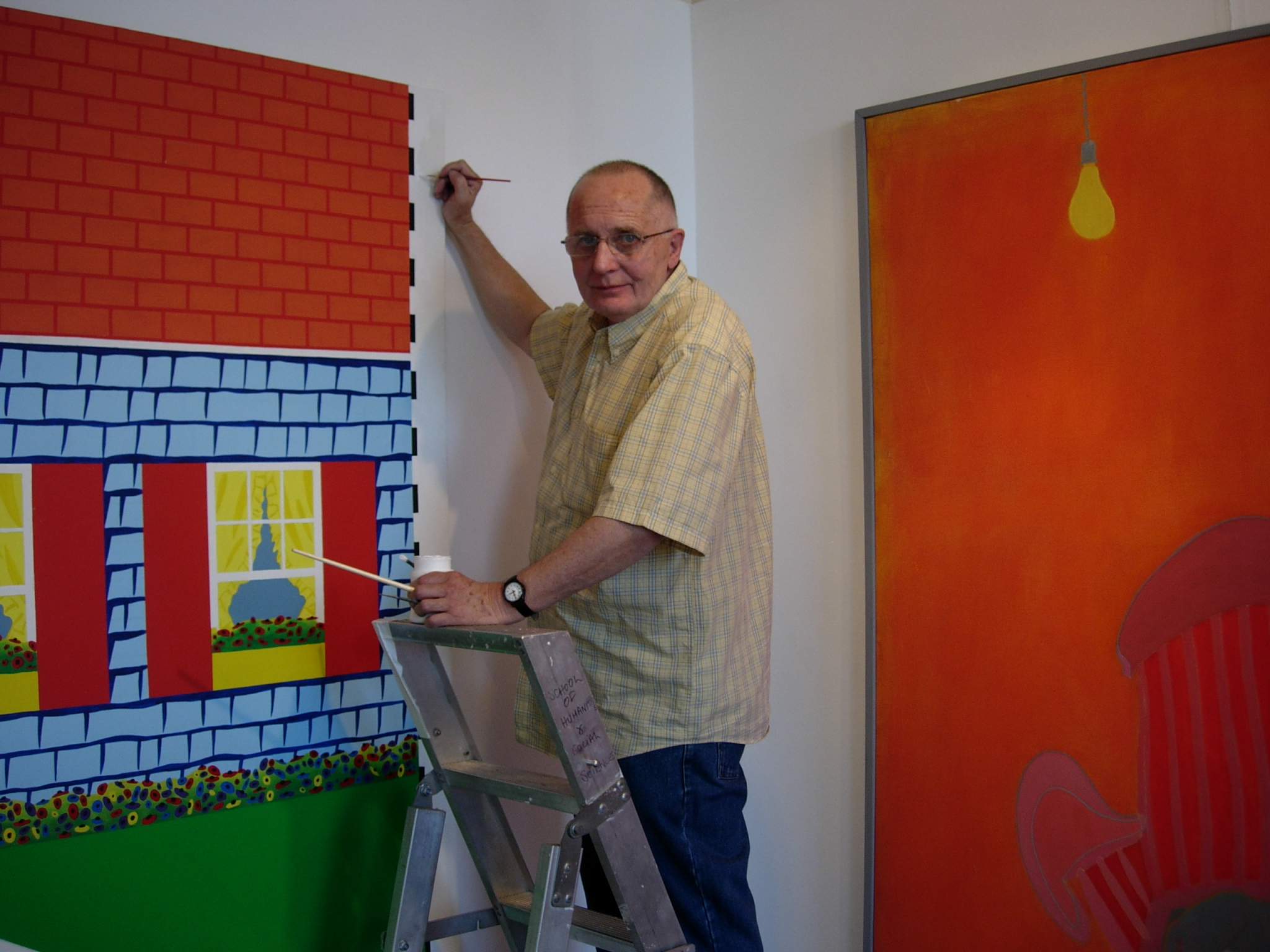 Ken Elias retouching his painting 'Days are where we live' hung alongside an Ernest Zobole painting, Zobole Gallery 2006